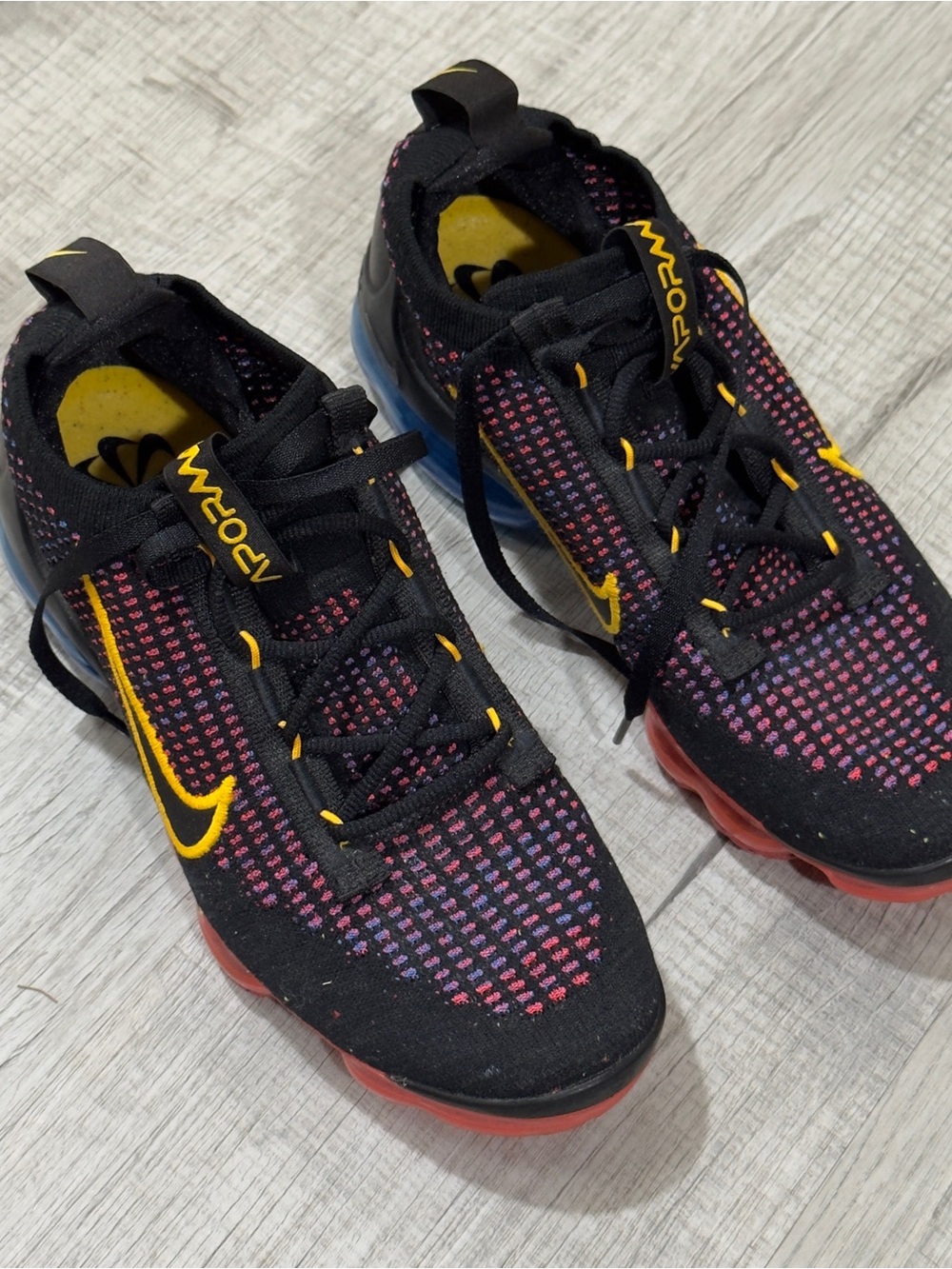 Nike Kids Black Knit Sneakers with Pink and Yellow Details